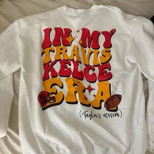 In my Travis Kelce Era crewneck Taylor swift